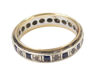 Lot 249 - A sapphire and diamond eternity ring, set with...