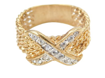 Lot 252 - A cross over dress ring, set with imitation...
