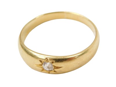 Lot 256 - An 18ct gold diamond solitaire ring, set with...