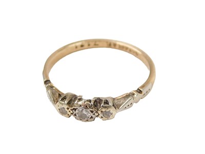 Lot 257 - Three stone diamond dress ring, set with three...