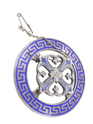 Lot 240 - A 20thC enamel brooch, formed as a disc with...