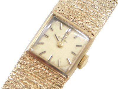 Lot 242 - A 9ct gold Omega lady's wristwatch, with...