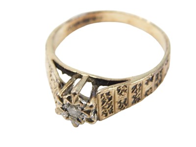 Lot 284 - A 9ct gold dress ring, centrally set with an...