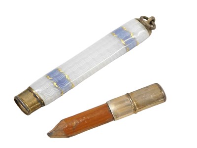 Lot 437 - An enamel pencil case, light and dark blue...