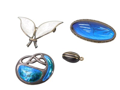 Lot 441 - Three silver brooches, comprising a silver and...
