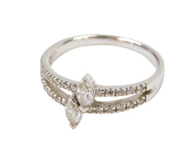 Lot 294 - An 18ct white gold diamond set dress ring,...