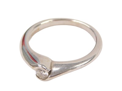 Lot 296 - A 18ct white gold diamond solitaire ring, set...