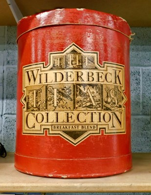 Lot 2002 - A decorative cardboard storage box, with label...