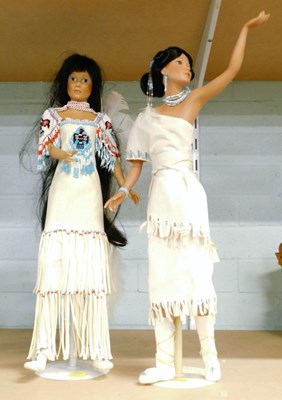 Lot 2007 - A pair of Native American dolls, dressed in...