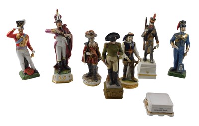 Lot 313 - A group of Continental porcelain figure groups,...