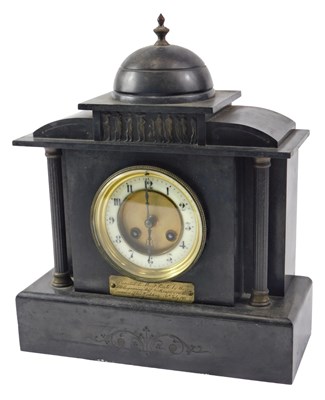 Lot 319 - An early 20thC French black slate mantel clock,...