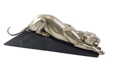 Lot 26 - An Art Deco model of a panther, in cast silver...