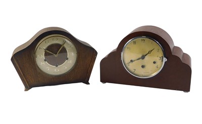 Lot 324 - Two 20thC oak cased mantel clocks, comprising...