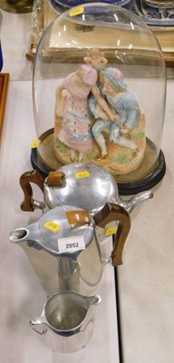Lot 2052 - A Picquot ware teapot, coffee pot, and milk...