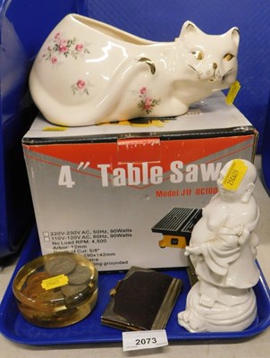 Lot 2073 - An Oriental Buddha figurine, a pottery cat...