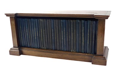 Lot 348 - A 20thC oak table top bookshelf, with canted...