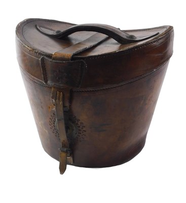 Lot 405 - A 20thC leather hat box, 33cm high.