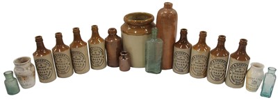 Lot 406 - A quantity of stoneware bottles, comprising...
