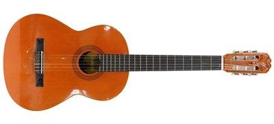 Lot 719 - An Encore acoustic guitar, in leatherette...