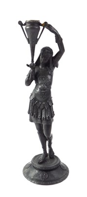 Lot 370 - A 20thC Spelter figure of a lady carrying...