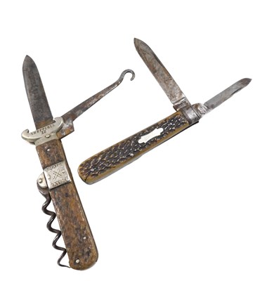 Lot 626 - Two horn handled folding knives, comprising a...