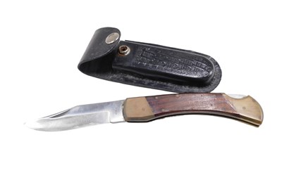 Lot 628 - A 20thC Ravi wooden handled knife, in...