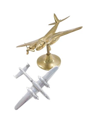 Lot 630 - A brass model Spitfire, 14cm high, and a...