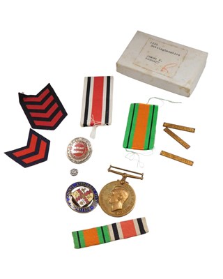 Lot 643 - An East Midlands 25 Year Motor Service silver...
