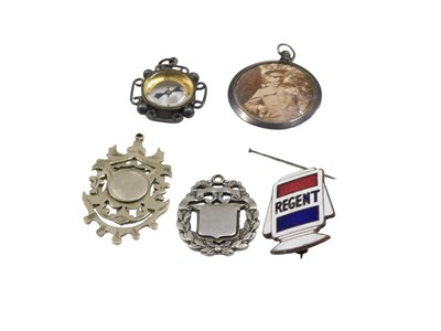 Lot 648 - A group of novelty badges, comprising compass,...