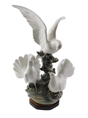 Lot 24 - A Lladro porcelain figure group, of three...