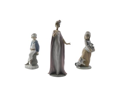 Lot 652 - Three Lladro porcelain figures, comprising a...