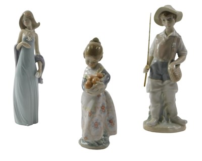 Lot 653 - Three Lladro porcelain figures, comprising a...