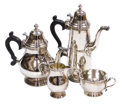 Lot 2 - An Elizabeth II silver four-piece tea and...
