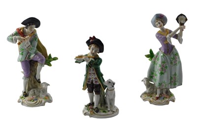 Lot 660 - Three Sitzendorf style figures, comprising a...