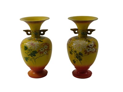 Lot 663 - A pair of 20thC vases, each with a flared rim,...