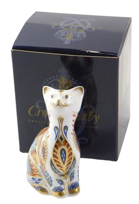 Lot 673 - A Royal Crown Derby kitten paperweight, with...