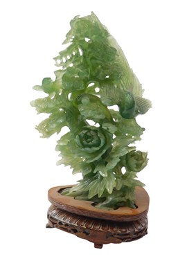 Lot 709 - A 20thC carved soapstone Chinese figure group,...