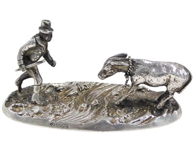 Lot 566 - A Victorian silver plated figure group, of man...