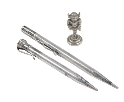 Lot 577 - Two silver cased pencils, and a steel Lincoln...