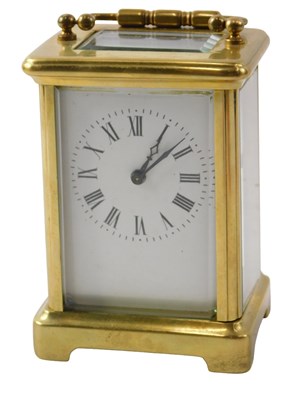 Lot 521 - A 20thC brass carriage clock, with swing...