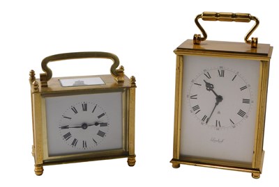 Lot 522 - Two 20thC brass carriage clocks, comprising a...