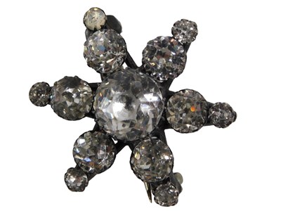 Lot 530 - A star set brooch, set with paste stones, in a...