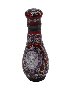 Lot 543 - A European enamel scent bottle, on a red...