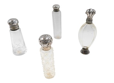Lot 549 - Four Victorian and later silver topped and cut...