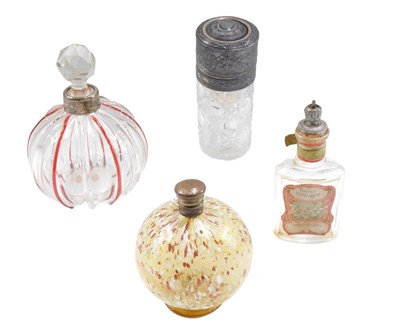 Lot 553 - Four 20thC glass scent bottles, comprising a...
