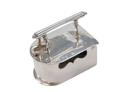 Lot 34 - A Dutch silver miniature of an iron, with...