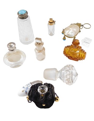 Lot 555 - A small group of scent bottles, comprising...