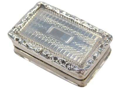 Lot 37 - A George IV silver vinaigrette, of rectangular...