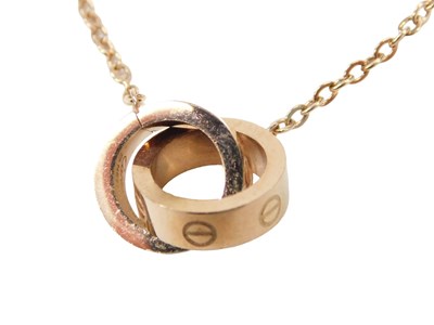 Lot 775 - A love links style necklace, with two...