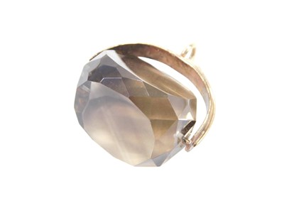 Lot 779 - A smokey quartz swivel agate pendant, the...